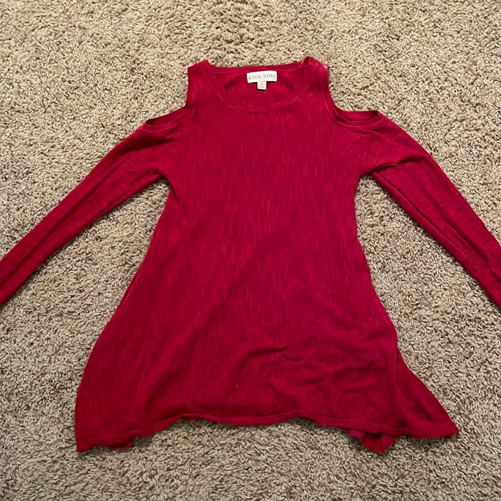 Red “cold shoulder” sweater